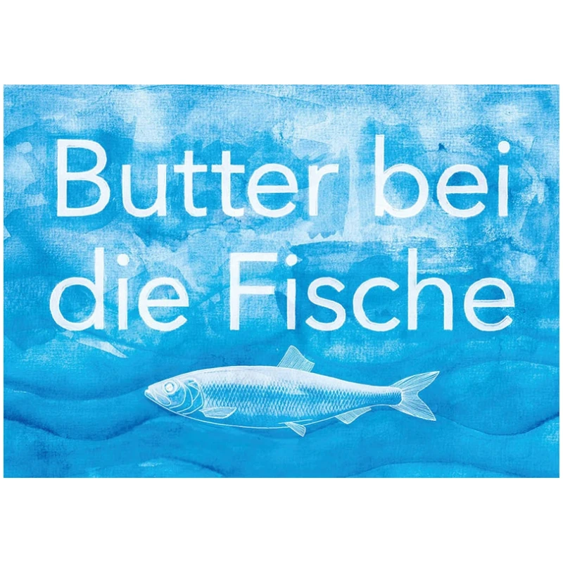 Die Platzdecke maritim „Dat Heet Moin“ 44x30cm zeigt auf blauem Grund den Spruch „Butter bei den Fischen“ in weißer Schrift, darunter eine schlichte Fischillustration.