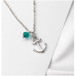 Schicke Anker- Halskette mit funkelndem Stein Silberne Anker-Halskette mit grünem Kristallanhänger, modisches Schmuckstück für maritime Liebhaber, elegantes Design.